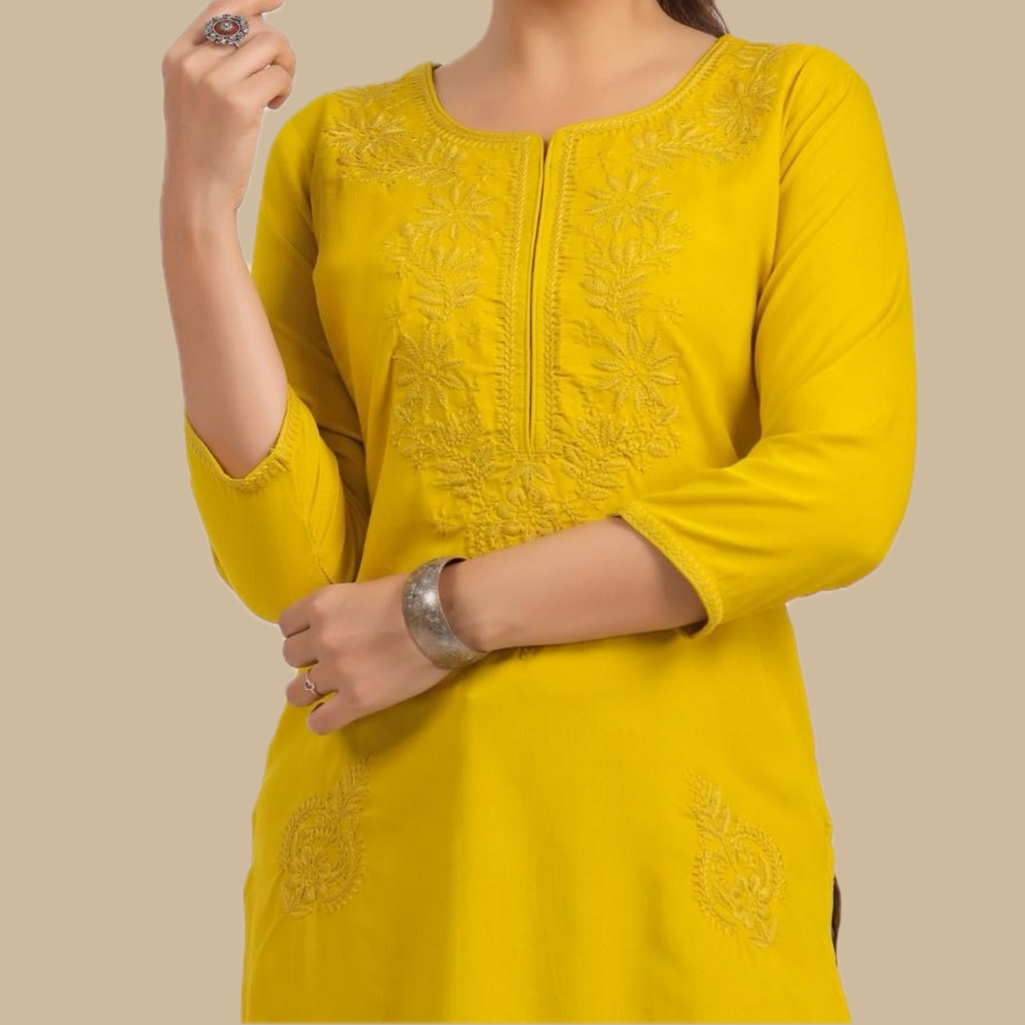 Yellow Chikankari Rayon Tunic with Embroidered Neck Yoke and Lower Panel Motif