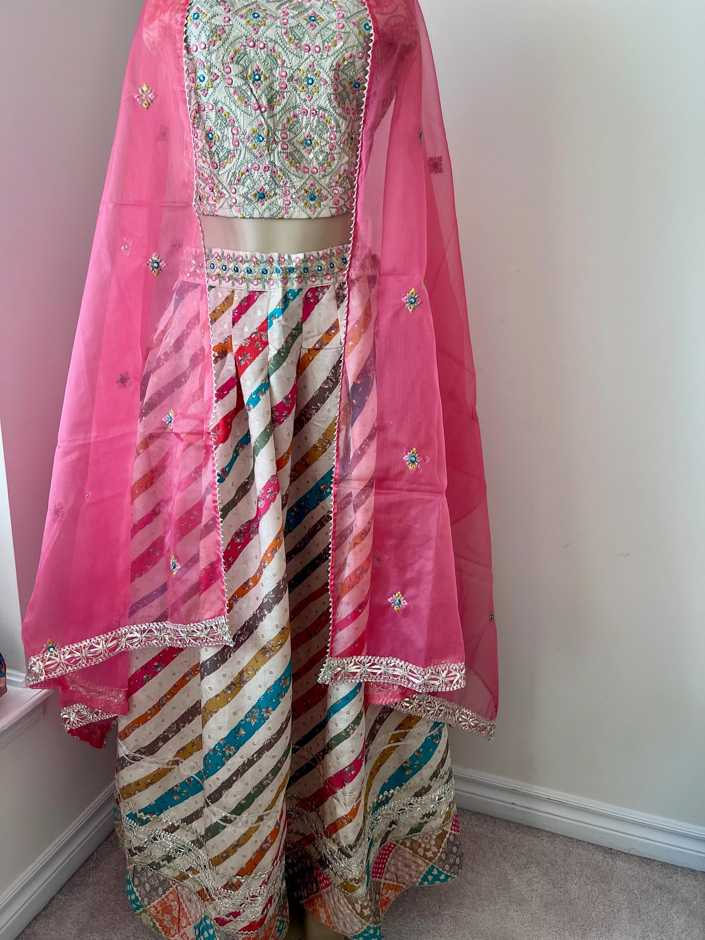 Light Lehenga Set with Sleeveless Sequinned Choli and Net Dupatta Lined with Gota