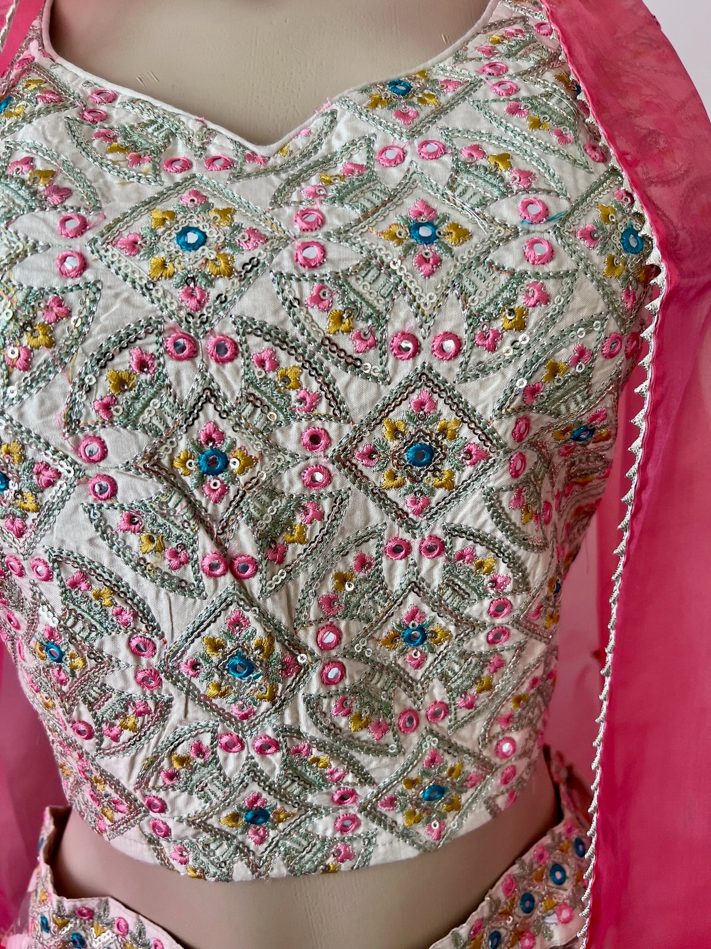 Light Lehenga Set with Sleeveless Sequinned Choli and Net Dupatta Lined with Gota