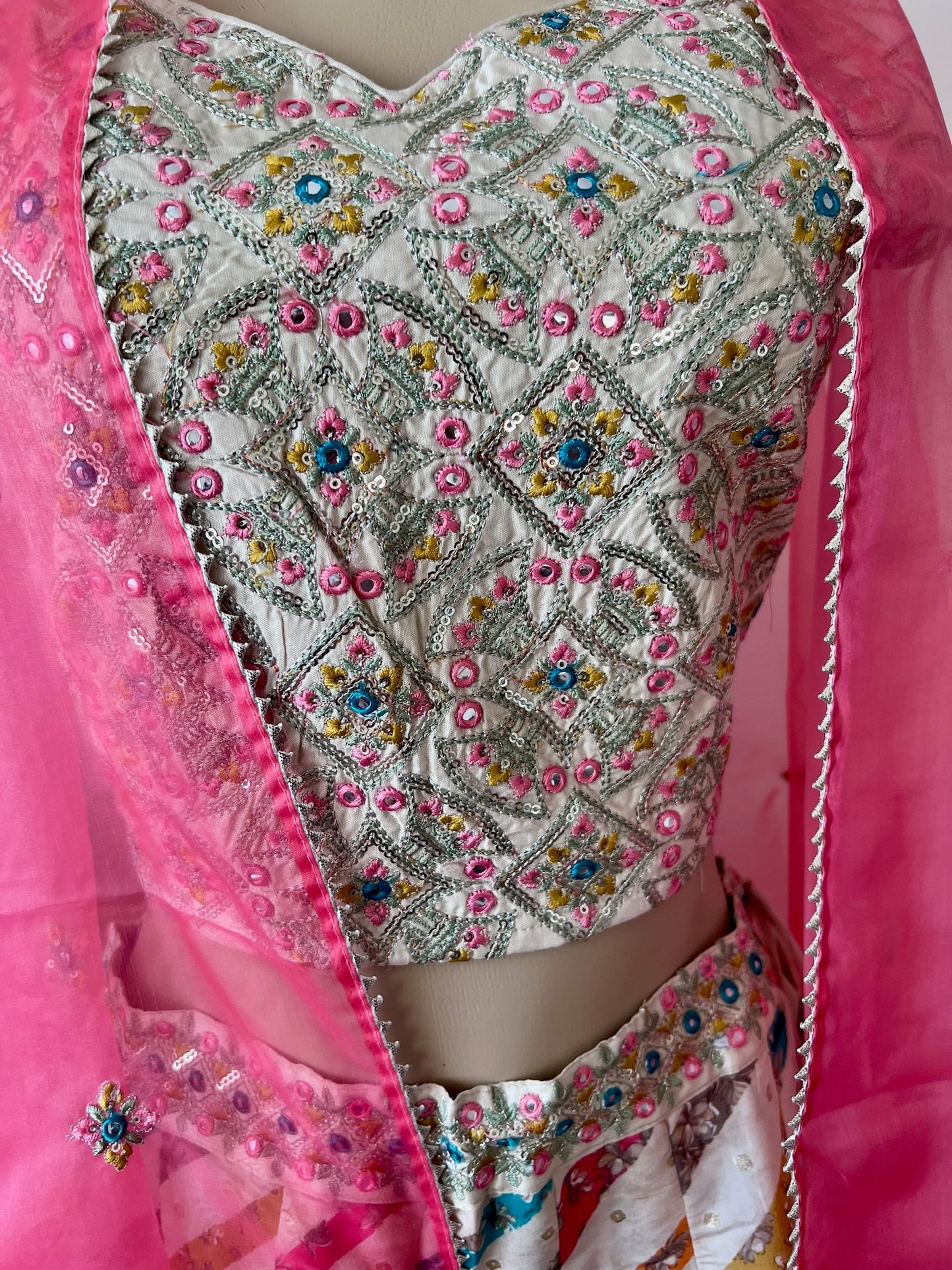 Light Lehenga Set with Sleeveless Sequinned Choli and Net Dupatta Lined with Gota