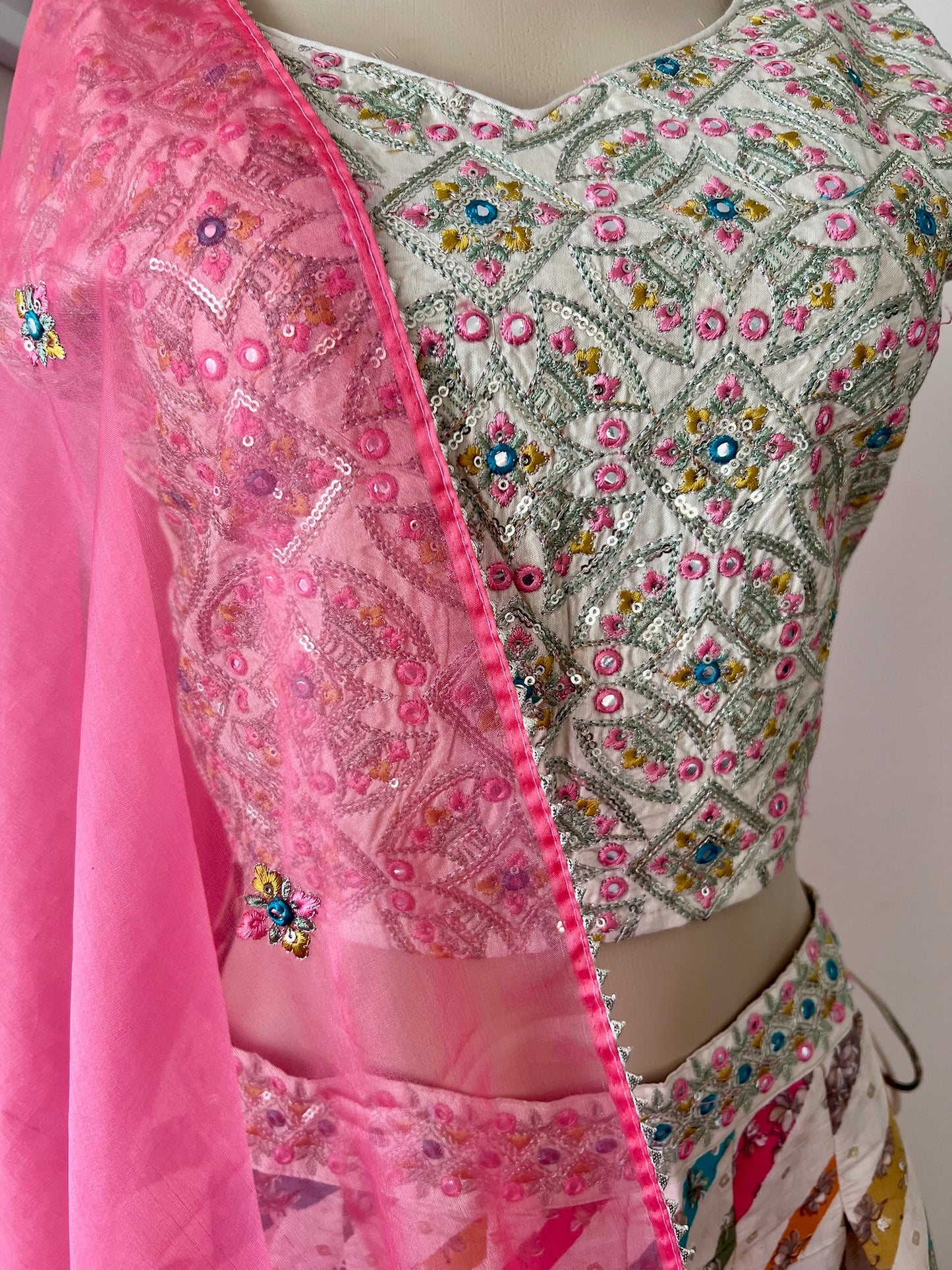 Light Lehenga Set with Sleeveless Sequinned Choli and Net Dupatta Lined with Gota